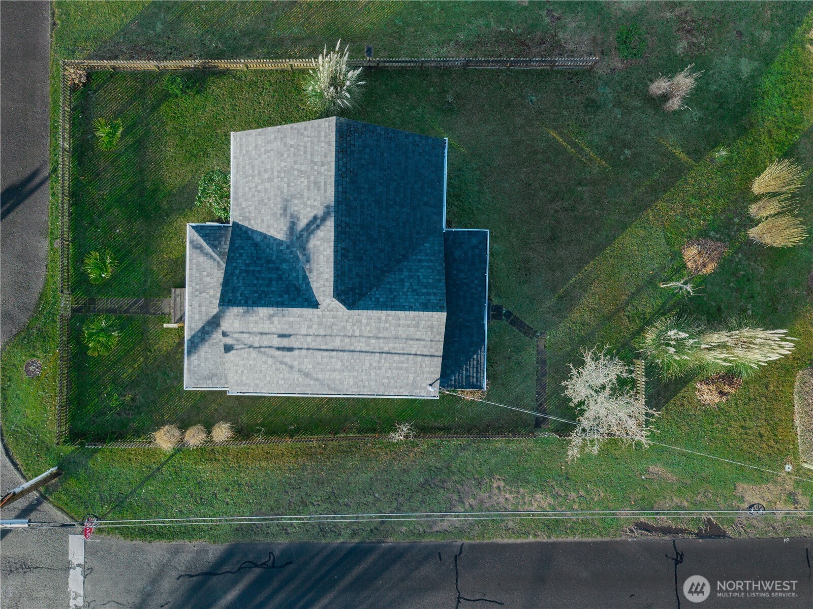 212 2nd Street Northeast Long Beach, WA 98631 - Photo 26 of 33 an aerial view of a house having yard