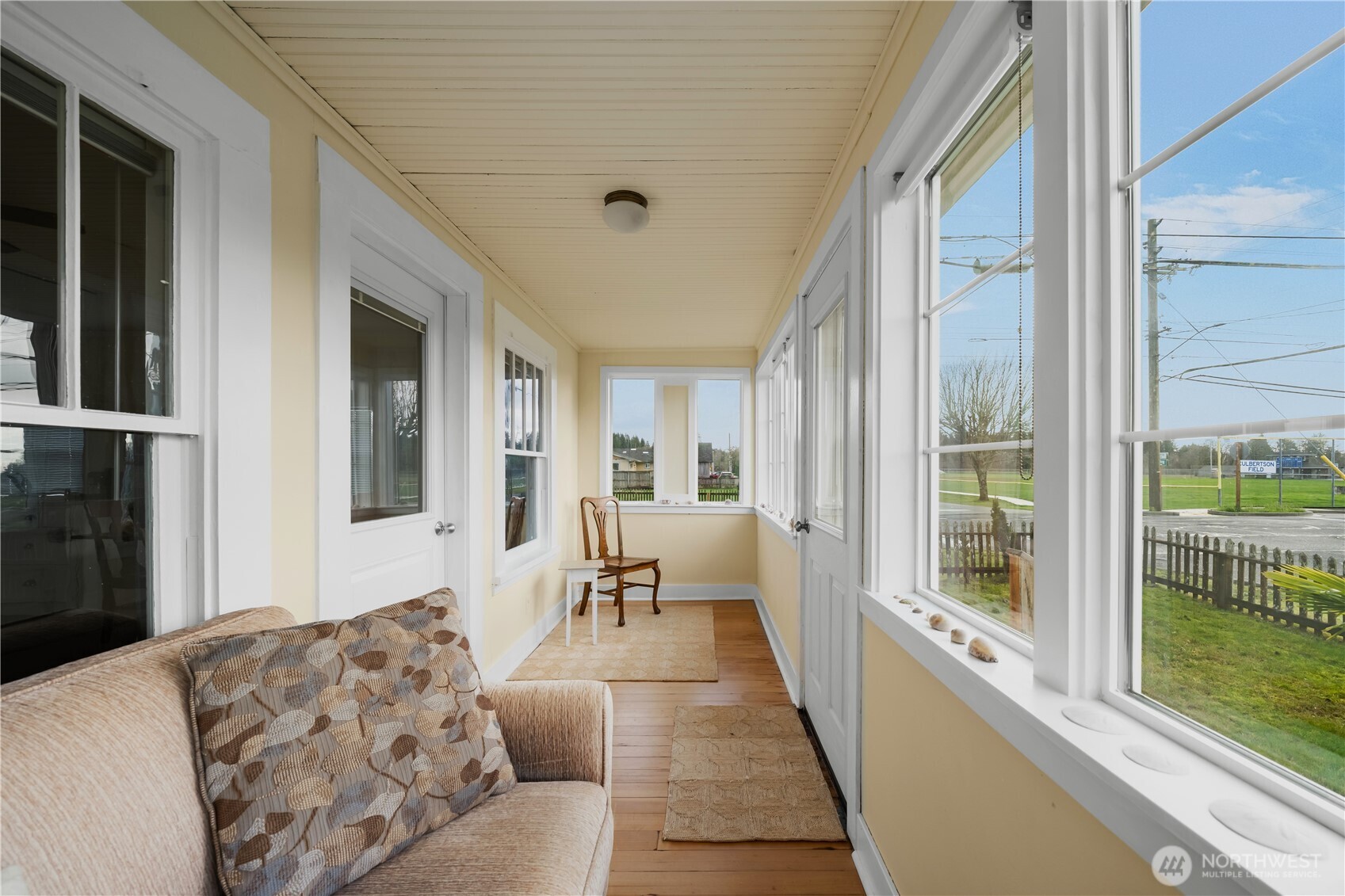 212 2nd Street Northeast Long Beach, WA 98631 - Photo 3 of 33 a living room with furniture and a large window