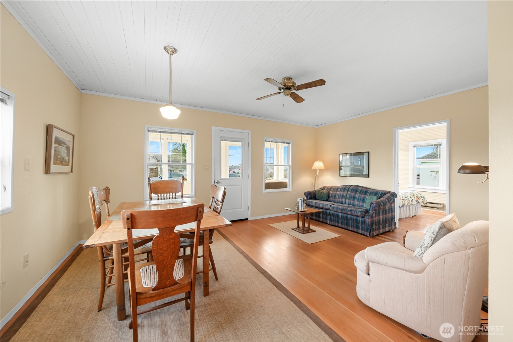 212 2nd Street Northeast Long Beach, WA 98631 - Photo 7 of 33 a living room with furniture a table and a window