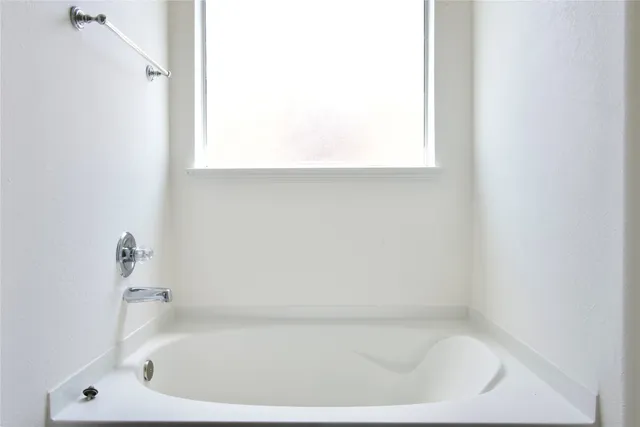 a bathroom with a bathtub