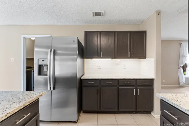 a view of livingroom with furniture and floor to ceiling window
