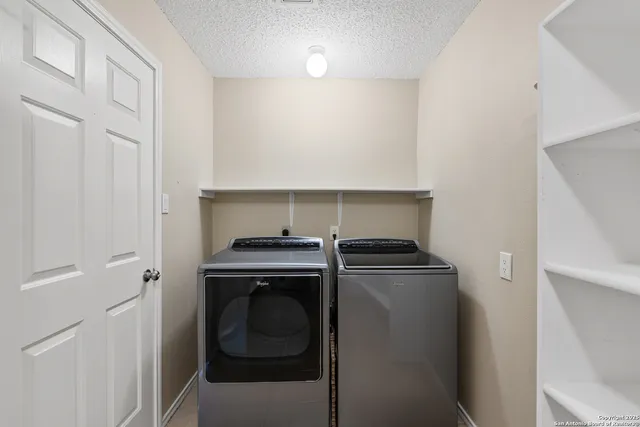 a view of entryway and hall with a window
