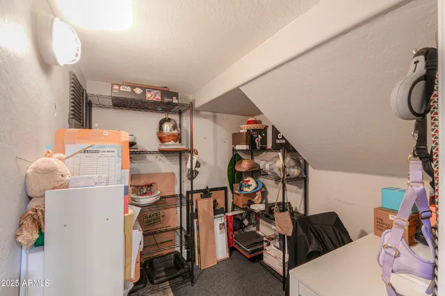 a kitchen with stainless steel appliances granite countertop a stove and a refrigerator