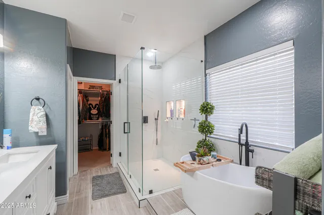 a room with lots of books and lots of furniture