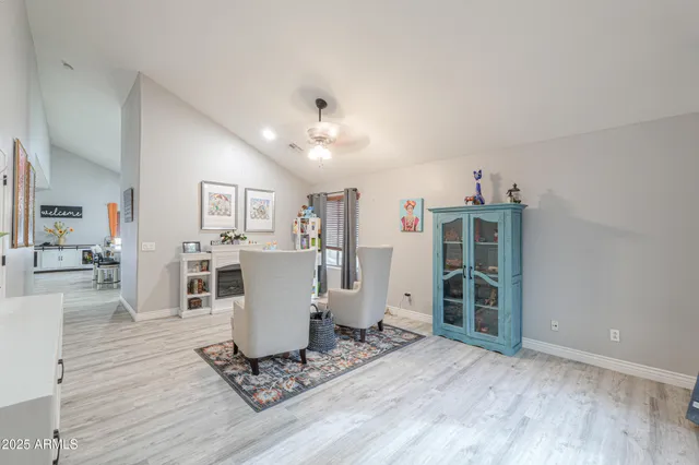 a living room with furniture and a window