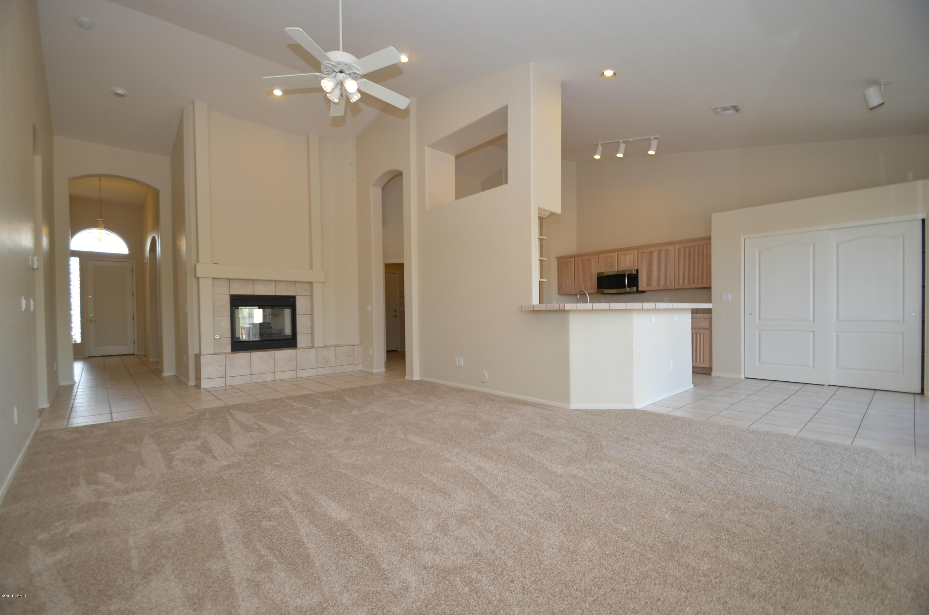 3060 North Ridgecrest, Unit 151 Mesa, AZ 85207 - Photo 4 of 32 Family Room & Kitchen