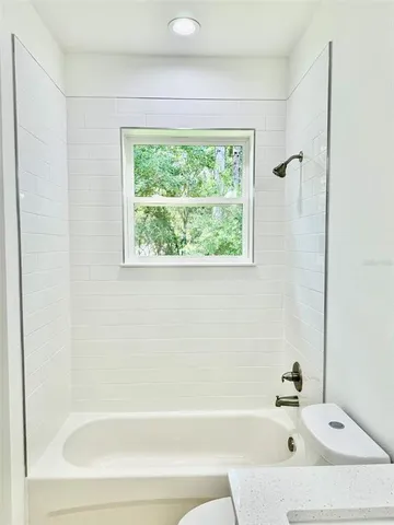 a bathroom with a bathtub