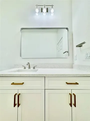 a view of a sink and a mirror