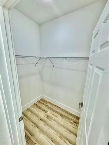 a view of a room with racks on the wall