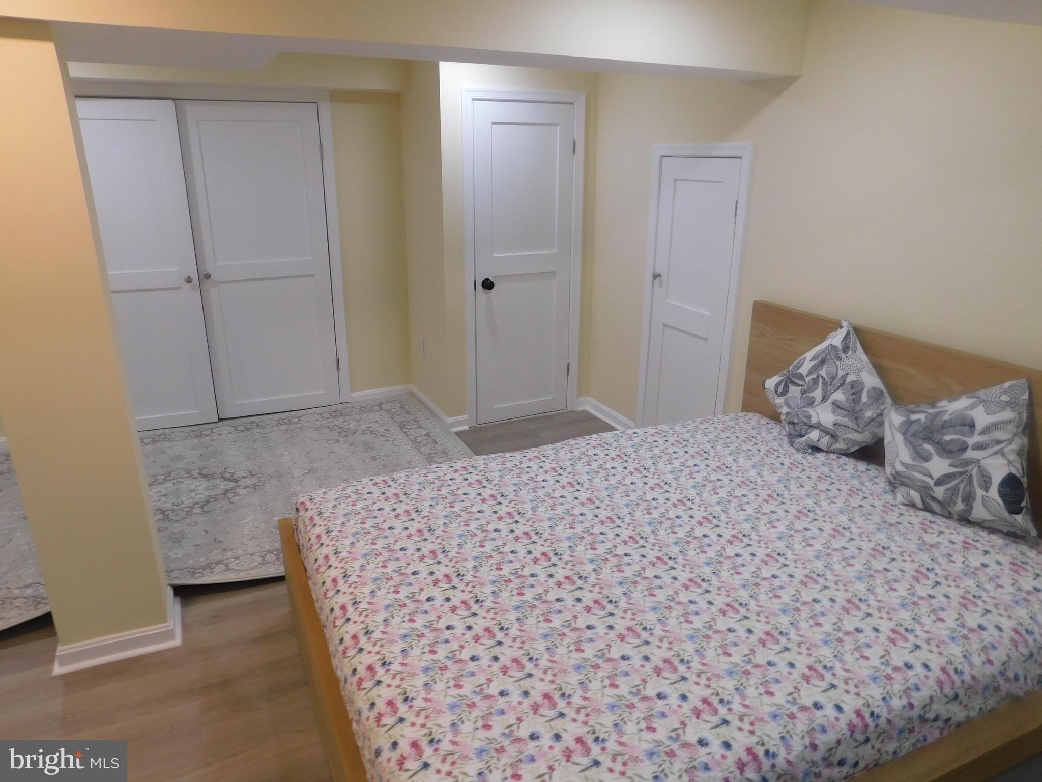 5600 11th Street North Arlington, VA 22205 - Photo 13 of 34 a bedroom with a bed and a shower