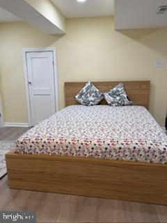 5600 11th Street North Arlington, VA 22205 - Photo 17 of 34 a bedroom with a bed