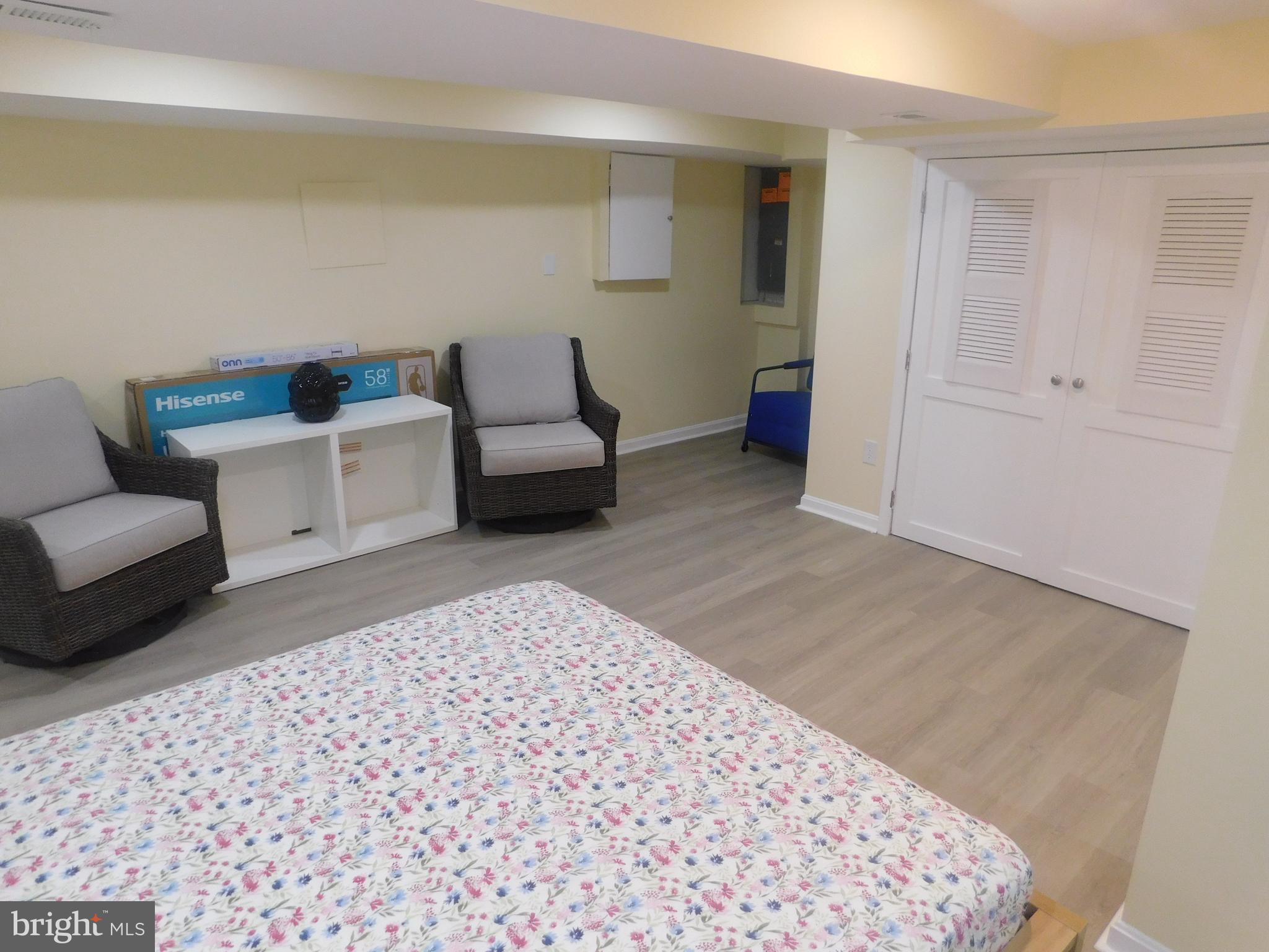 5600 11th Street North Arlington, VA 22205 - Photo 18 of 34 a living room with furniture and white walls