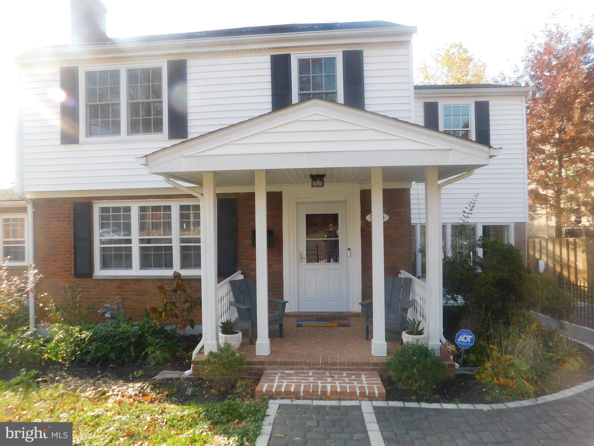5600 11th Street North Arlington, VA 22205 - Photo 2 of 34 a front view of a house with a yard