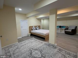 5600 11th Street North Arlington, VA 22205 - Photo 23 of 34 a view of bedroom with furniture and wooden floor