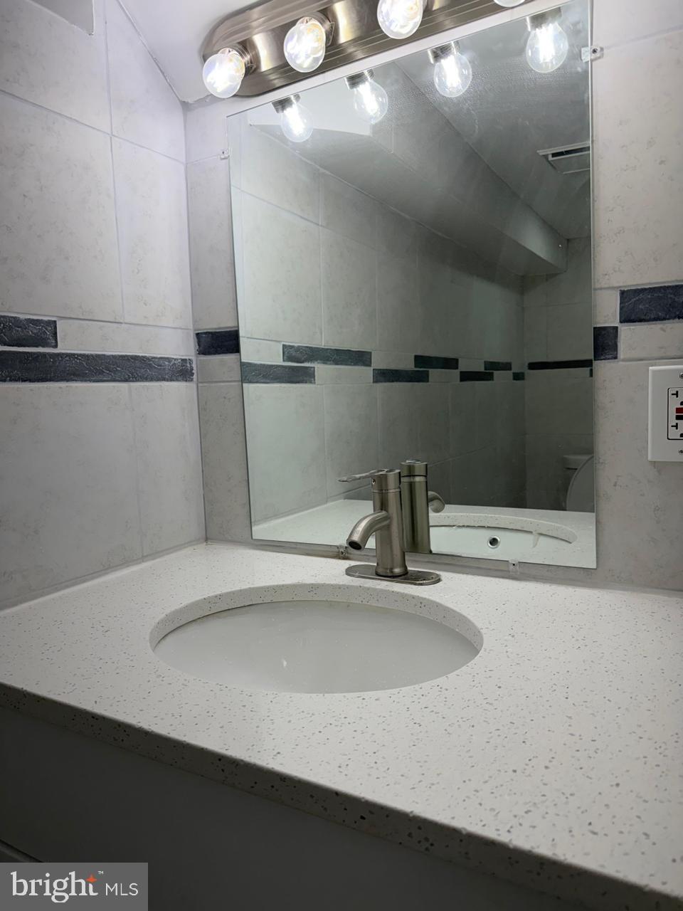 5600 11th Street North Arlington, VA 22205 - Photo 25 of 34 a close view of sink