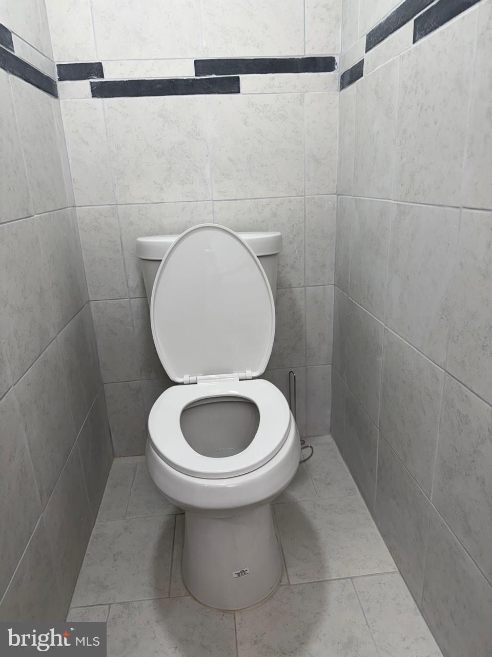 5600 11th Street North Arlington, VA 22205 - Photo 27 of 34 a bathroom with a toilet and a sink