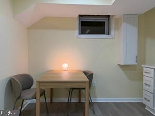 5600 11th Street North Arlington, VA 22205 - Photo 32 of 34 a room with furniture and a chair