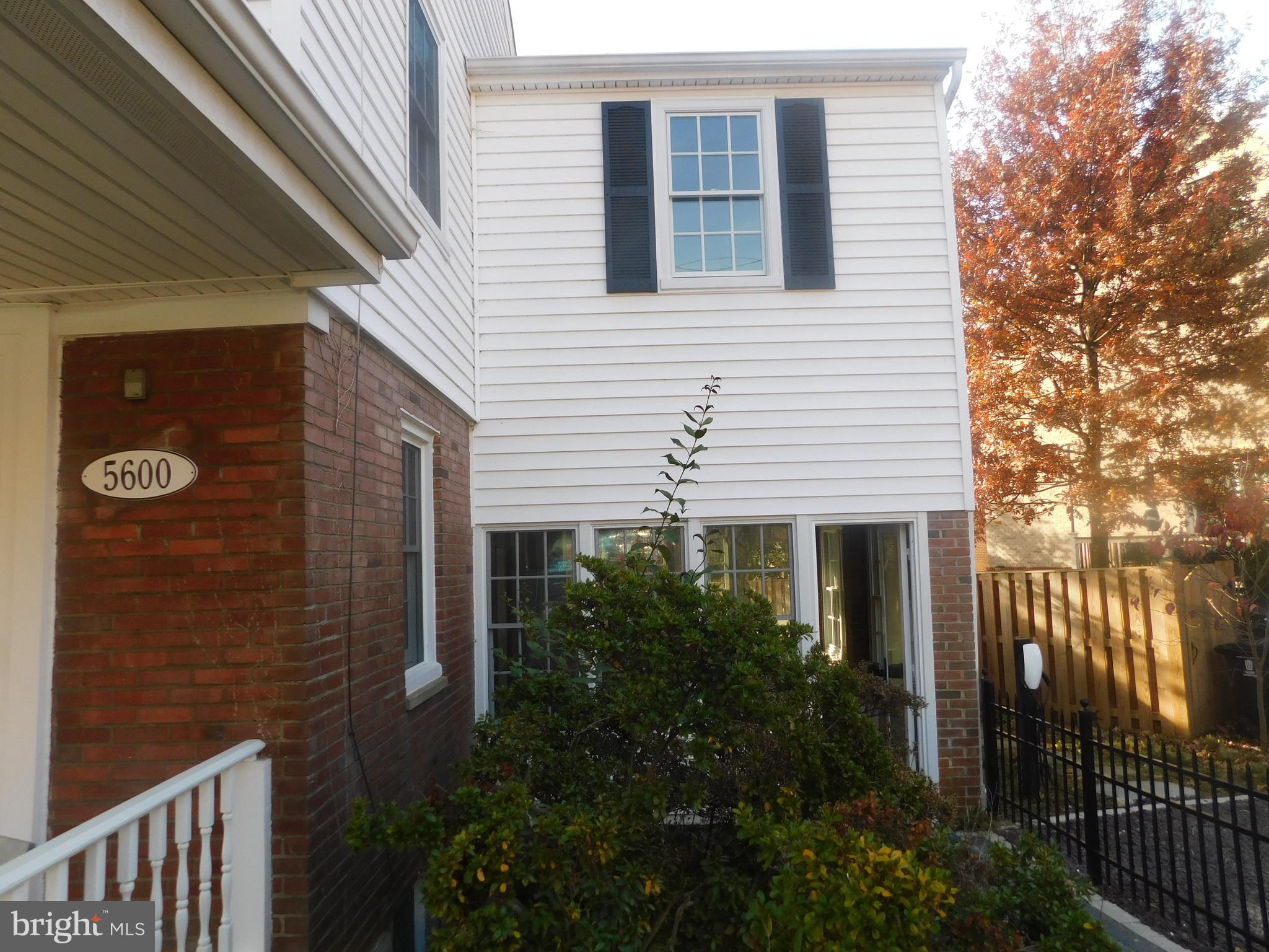 5600 11th Street North Arlington, VA 22205 - Photo 4 of 34 a view of house that has a tree in front of it