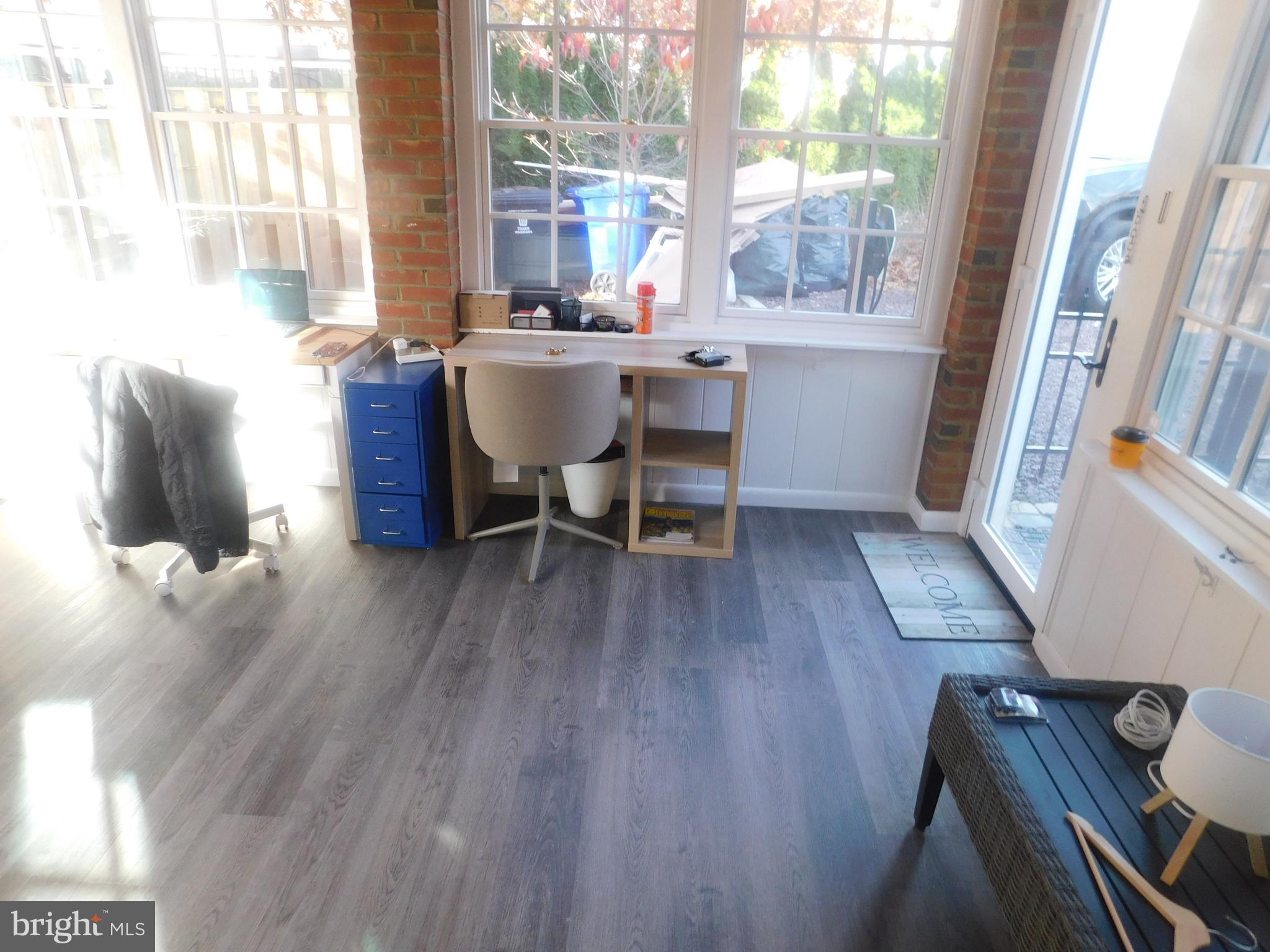 5600 11th Street North Arlington, VA 22205 - Photo 9 of 34 a view of a dining room with furniture and wooden floor