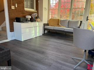 5600 11th Street North Arlington, VA 22205 - Photo 10 of 34 a living room with furniture and a large window