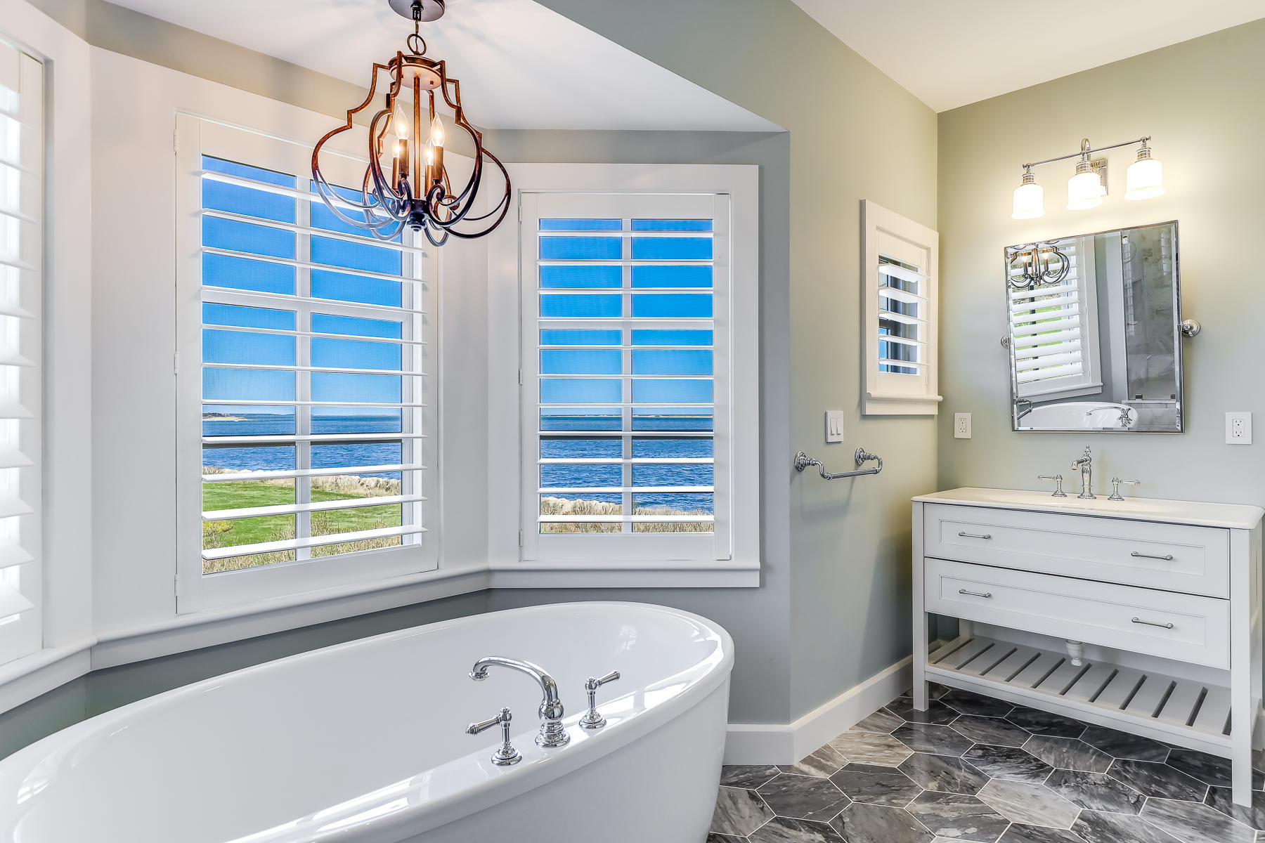 80 Quasson Road Chatham, MA 02633 - Photo 54 of 81 a bathroom with a bathtub sink and window