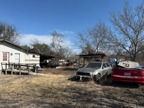 a car parked in front of a house