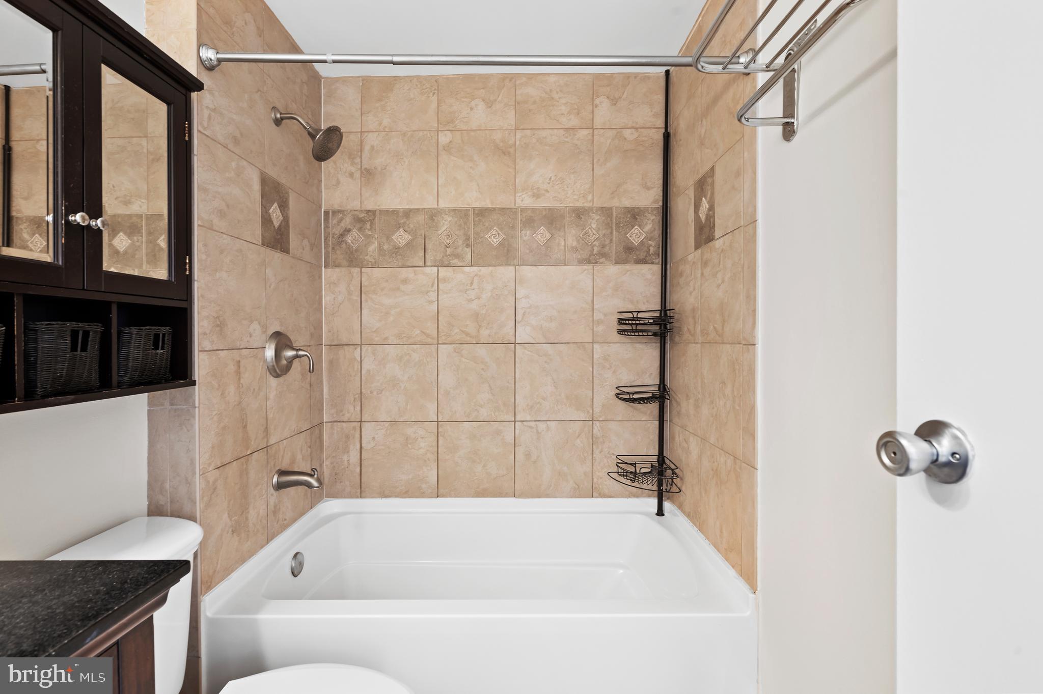 136 North Bread Street, Unit 130 Philadelphia, PA 19106 - Photo 12 of 31 a bathroom with a shower and a bath tub