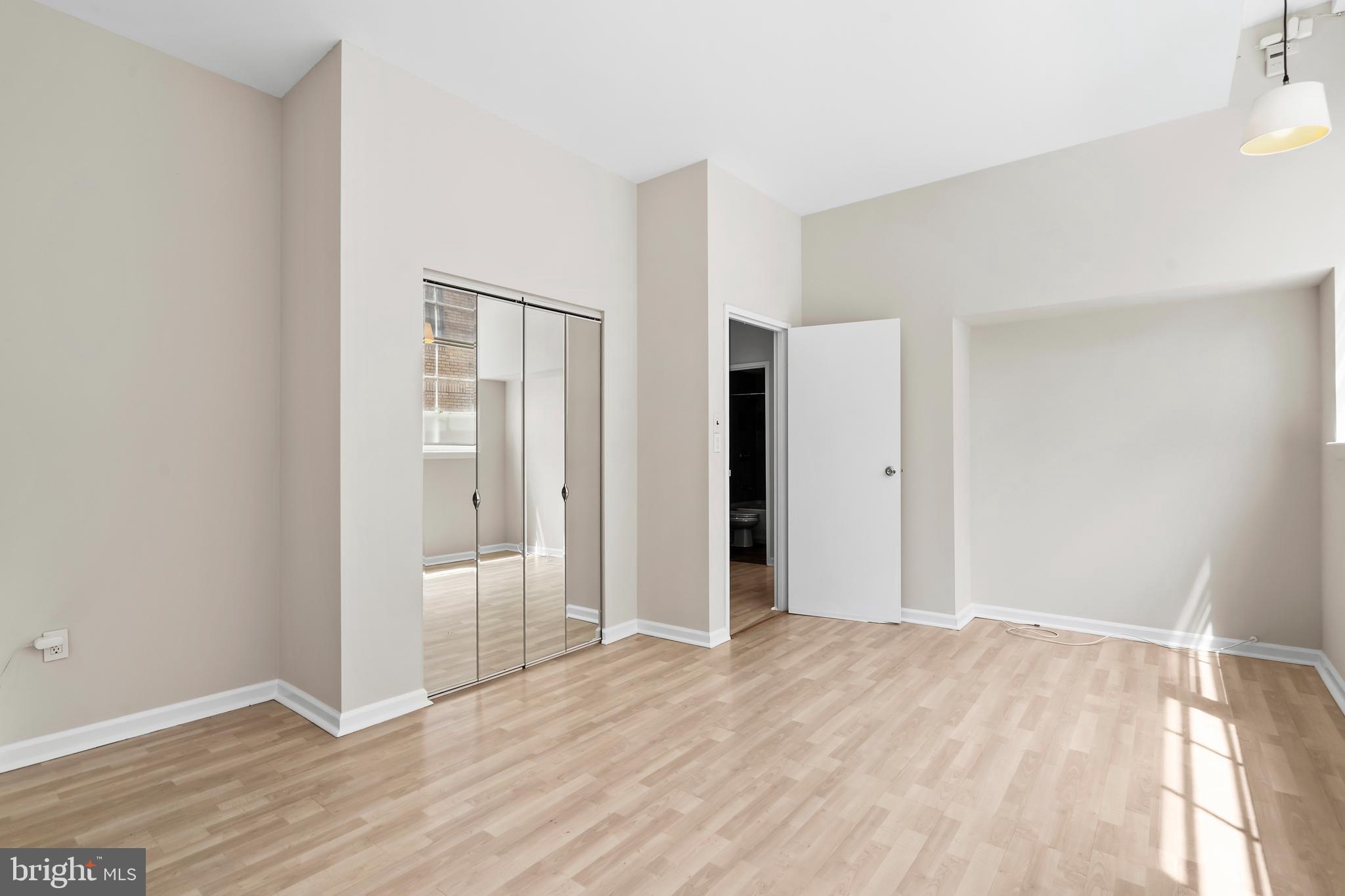 136 North Bread Street, Unit 130 Philadelphia, PA 19106 - Photo 17 of 31 a view of empty room with wooden floor