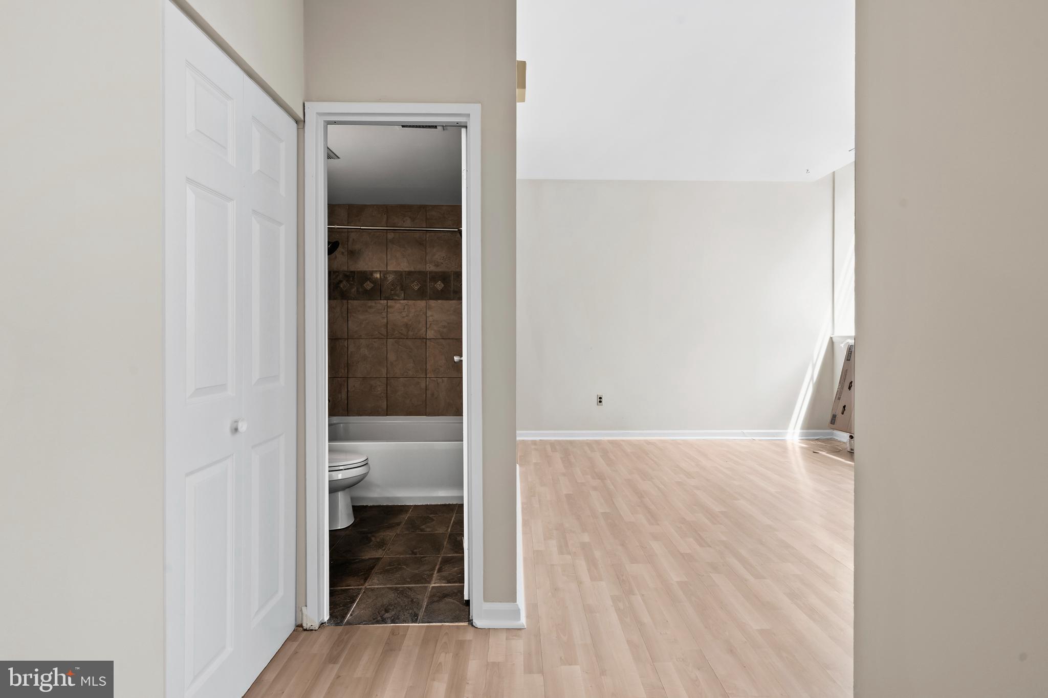 136 North Bread Street, Unit 130 Philadelphia, PA 19106 - Photo 19 of 31 a view of a room with wooden floor
