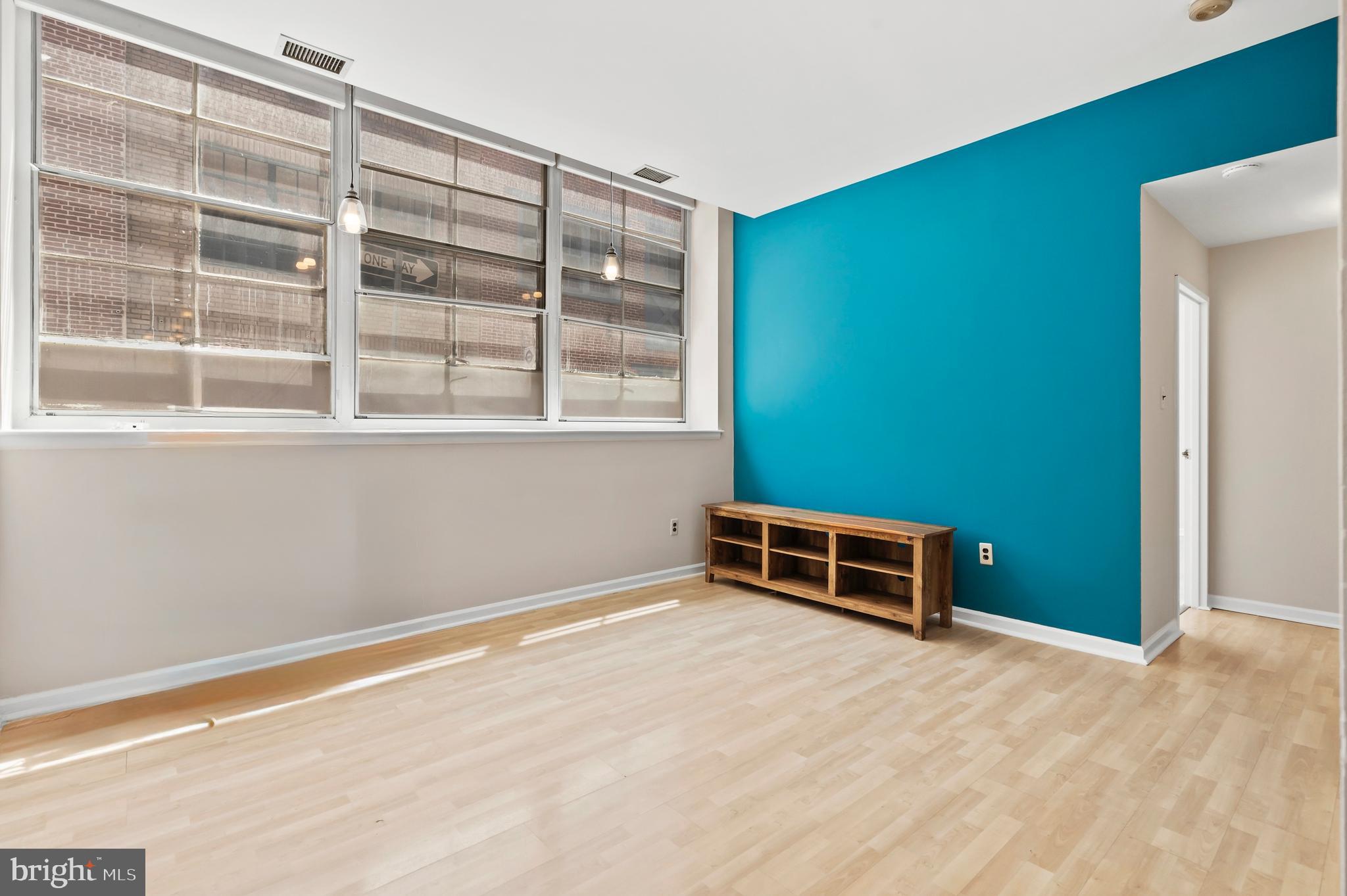 136 North Bread Street, Unit 130 Philadelphia, PA 19106 - Photo 2 of 31 a view of an empty room with a window