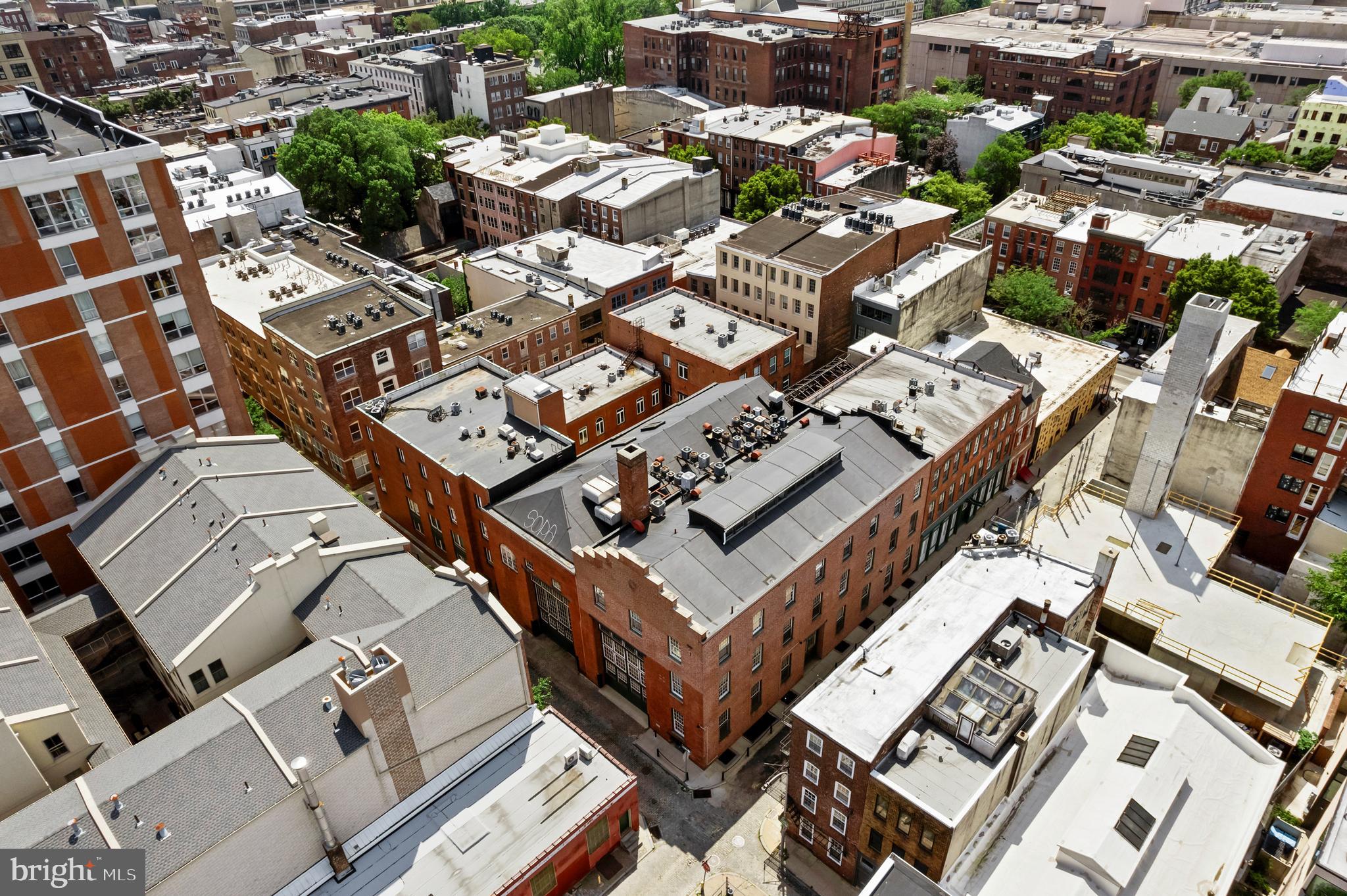 136 North Bread Street, Unit 130 Philadelphia, PA 19106 - Photo 30 of 31 an aerial view of a residential apartment building with parking
