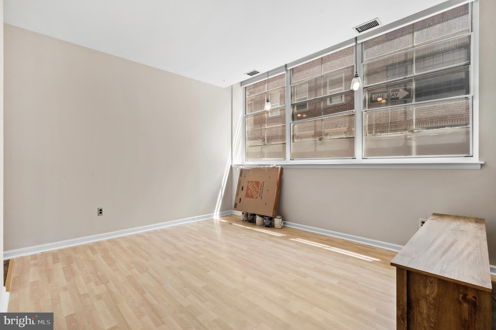 136 North Bread Street, Unit 130 Philadelphia, PA 19106 - Photo 4 of 31 a view of an empty room with a window