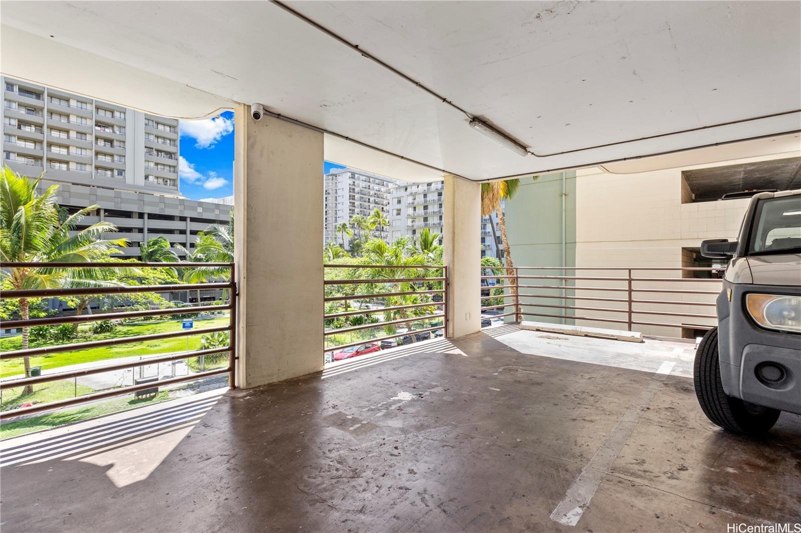 440 Seaside Avenue, Unit 404 Honolulu, HI 96815 - Photo 18 of 21 a view of empty room with wooden floor and fan