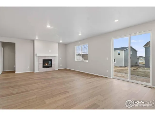 a kitchen with stainless steel appliances a refrigerator sink and cabinets