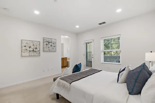 a bathroom with a sink a vanity and a mirror