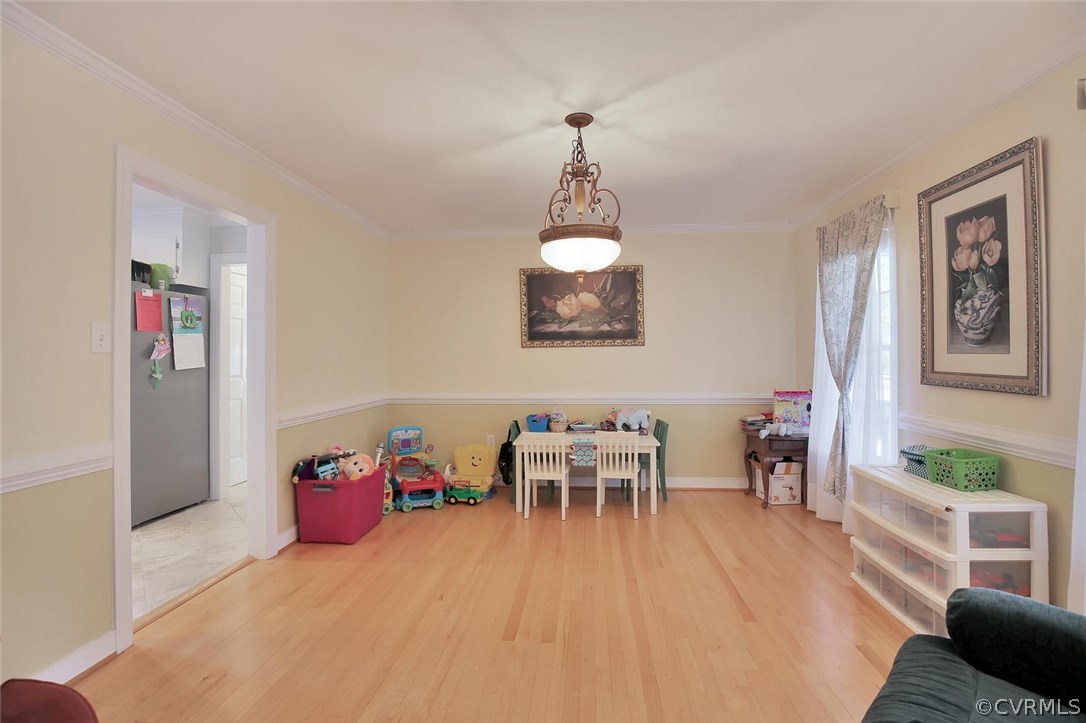 18302 West County Line Road Midlothian, VA 23112 - Photo 6 of 23 Formal Dining Room has hardwood floors, crown mold