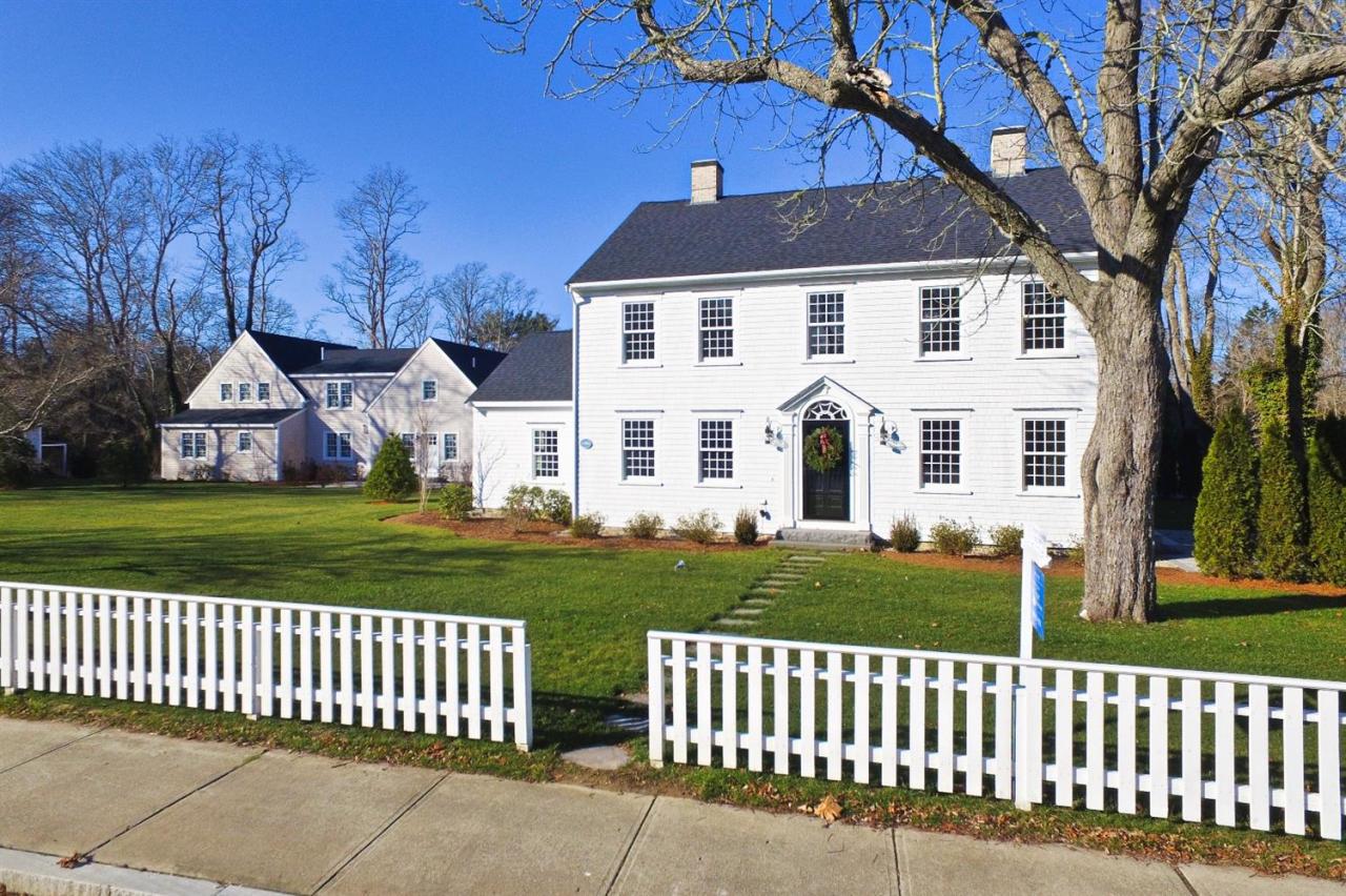 80 County Road, Unit 3 North Falmouth, MA 02556 - Photo 11 of 17 a front view of a house with a garden