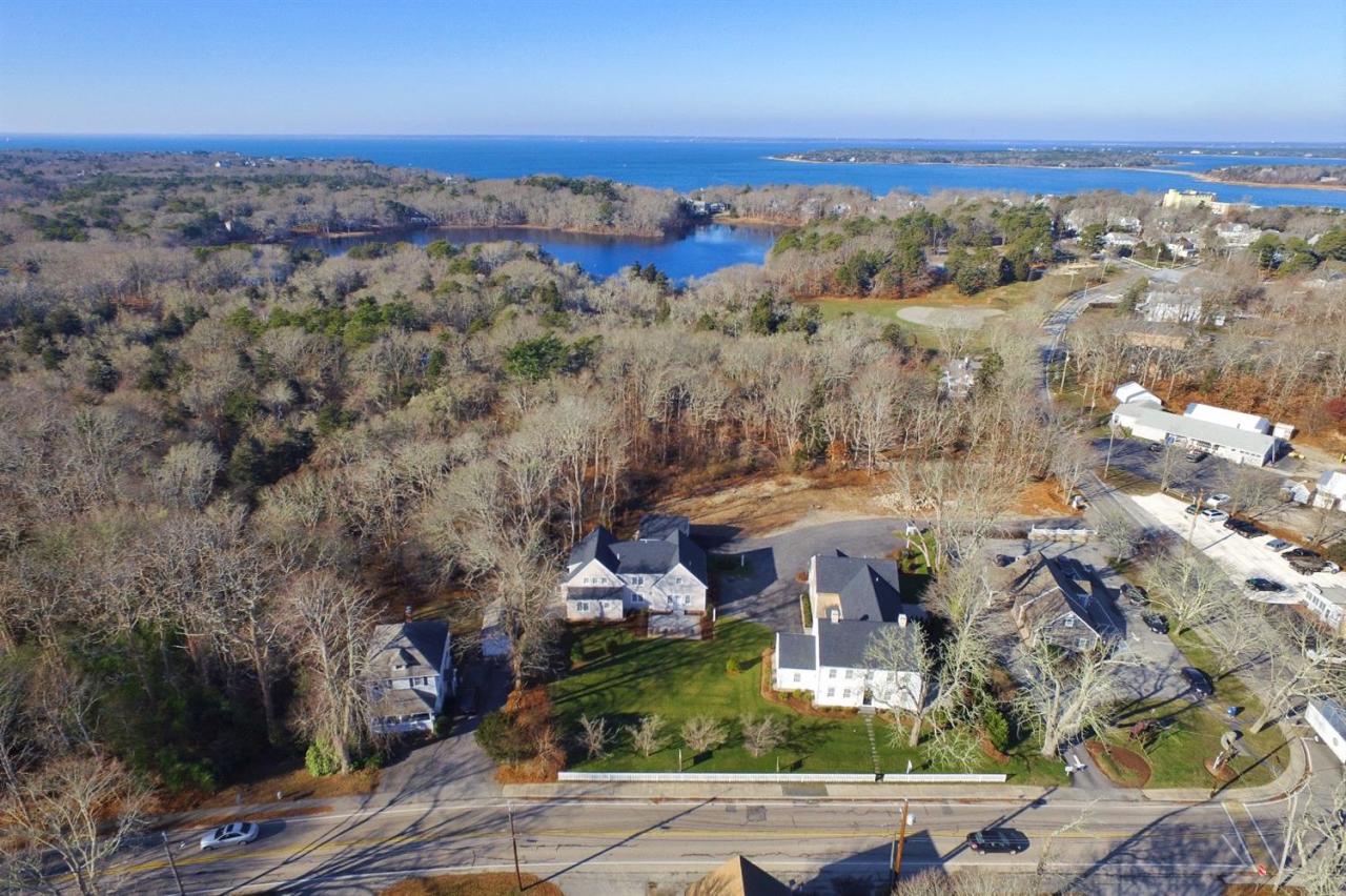 80 County Road, Unit 3 North Falmouth, MA 02556 - Photo 12 of 17 an aerial view of a houses with a yard