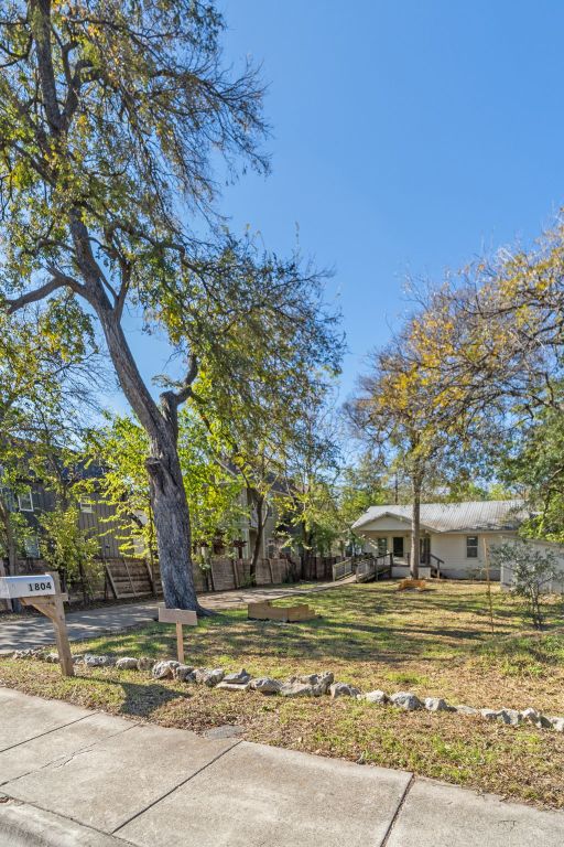 1804 Singleton Avenue Austin, TX 78702 - Photo 2 of 36 a view of a yard with a tree