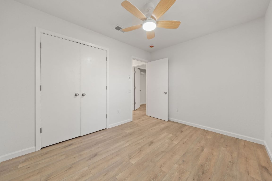 1804 Singleton Avenue Austin, TX 78702 - Photo 23 of 36 a view of an empty room with a fan
