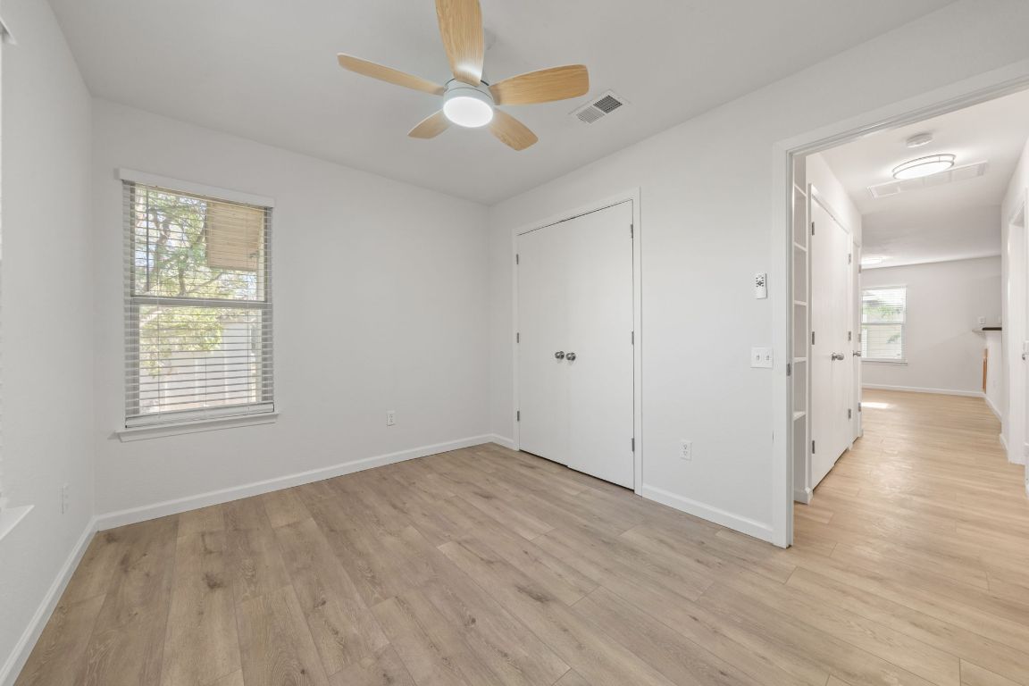 1804 Singleton Avenue Austin, TX 78702 - Photo 24 of 36 wooden floor in an empty room with a window