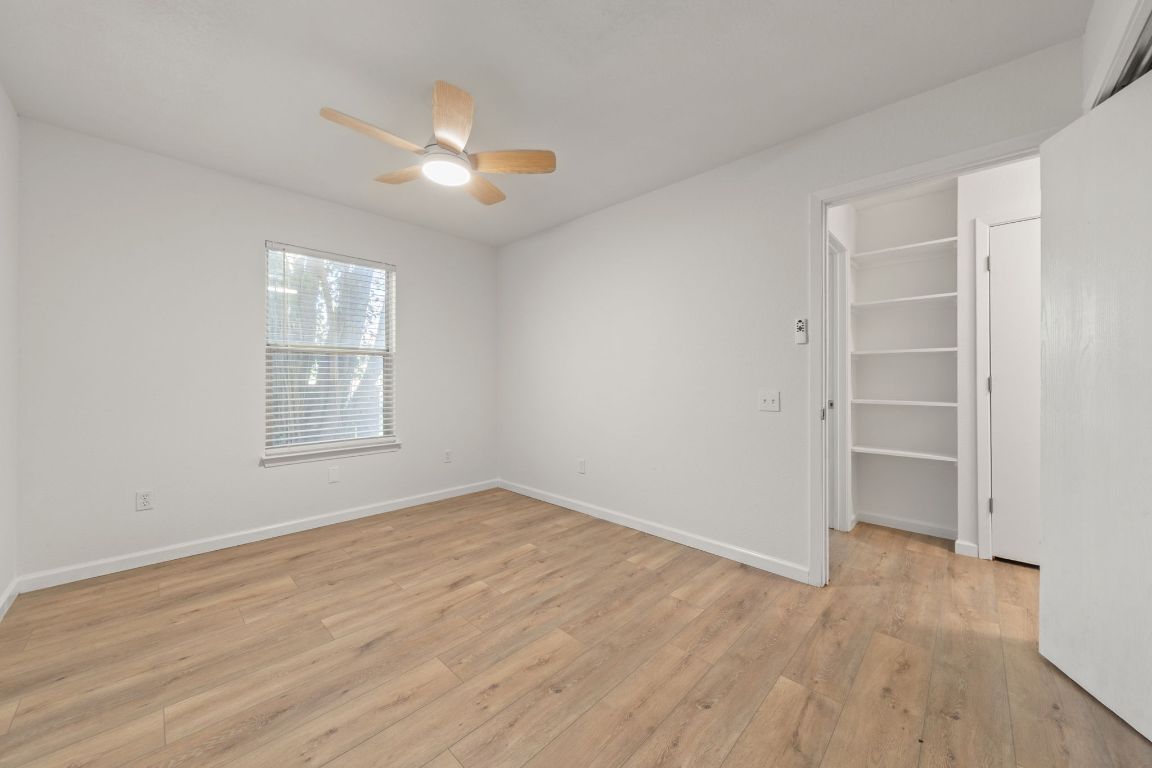 1804 Singleton Avenue Austin, TX 78702 - Photo 29 of 36 wooden floor in an empty room with a window