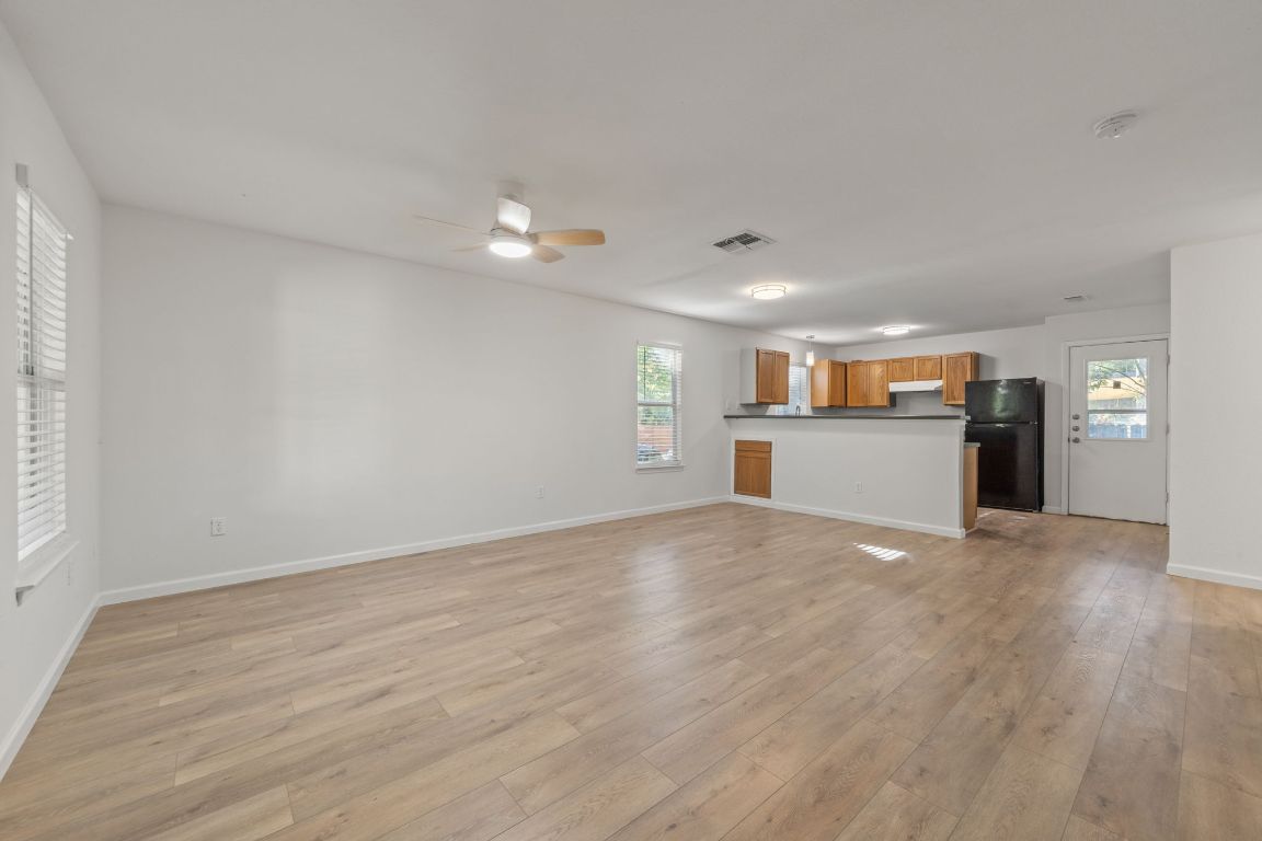 1804 Singleton Avenue Austin, TX 78702 - Photo 9 of 36 a view of a kitchen with a sink and a stove top oven