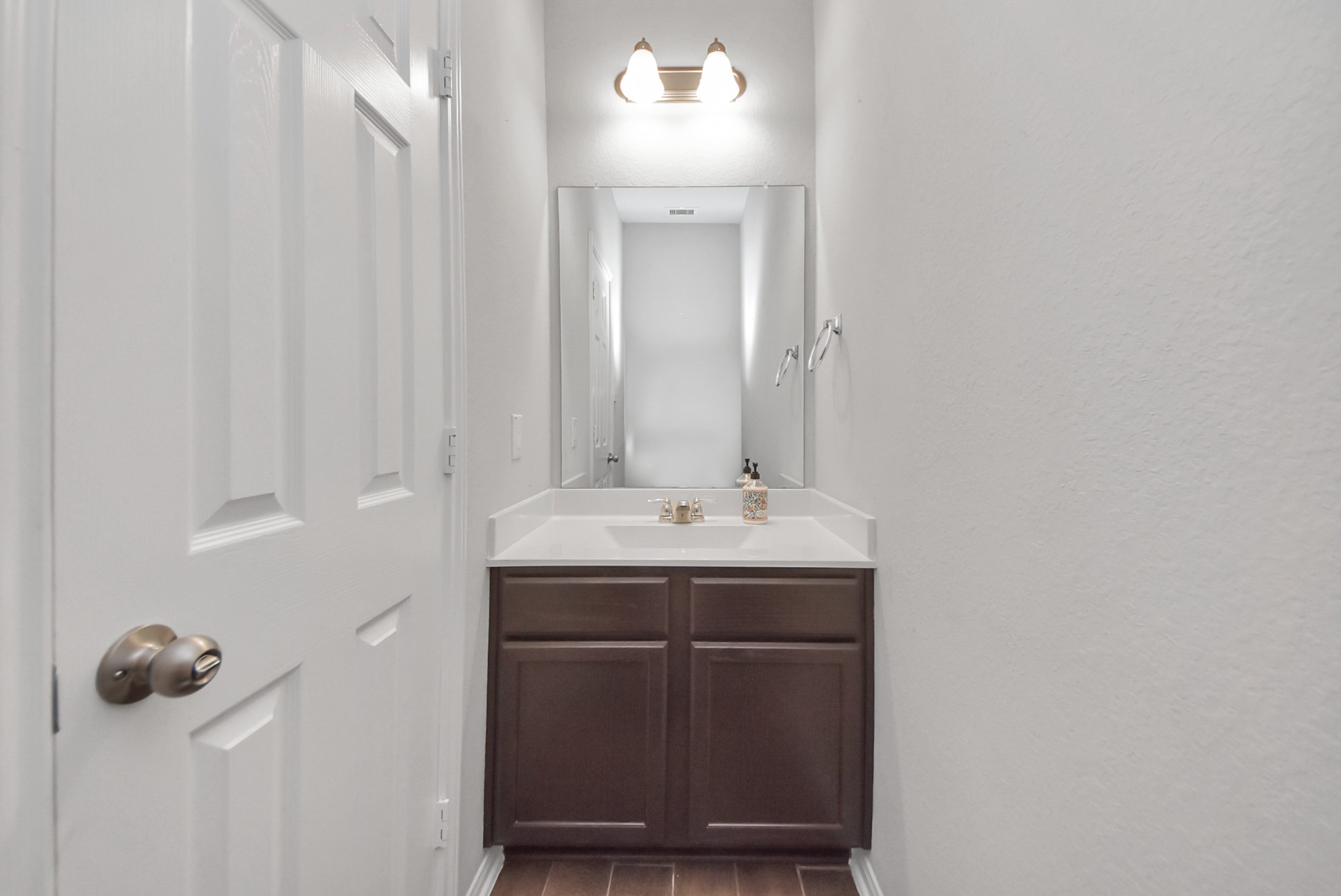 4239 Wyanngate Drive Spring, TX 77373 - Photo 15 of 36 a bathroom with a sink and a mirror