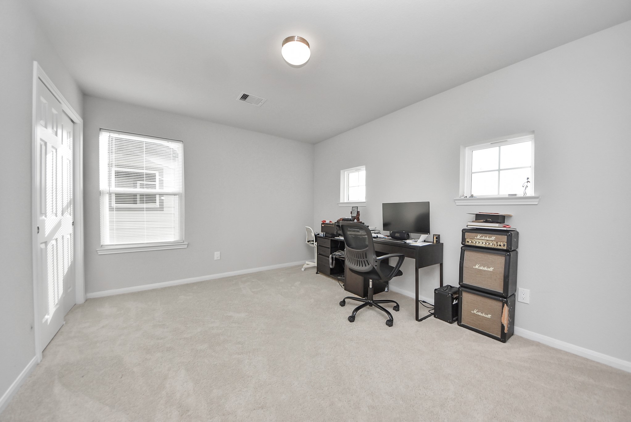 4239 Wyanngate Drive Spring, TX 77373 - Photo 23 of 36 a view of a workspace with furniture and a window