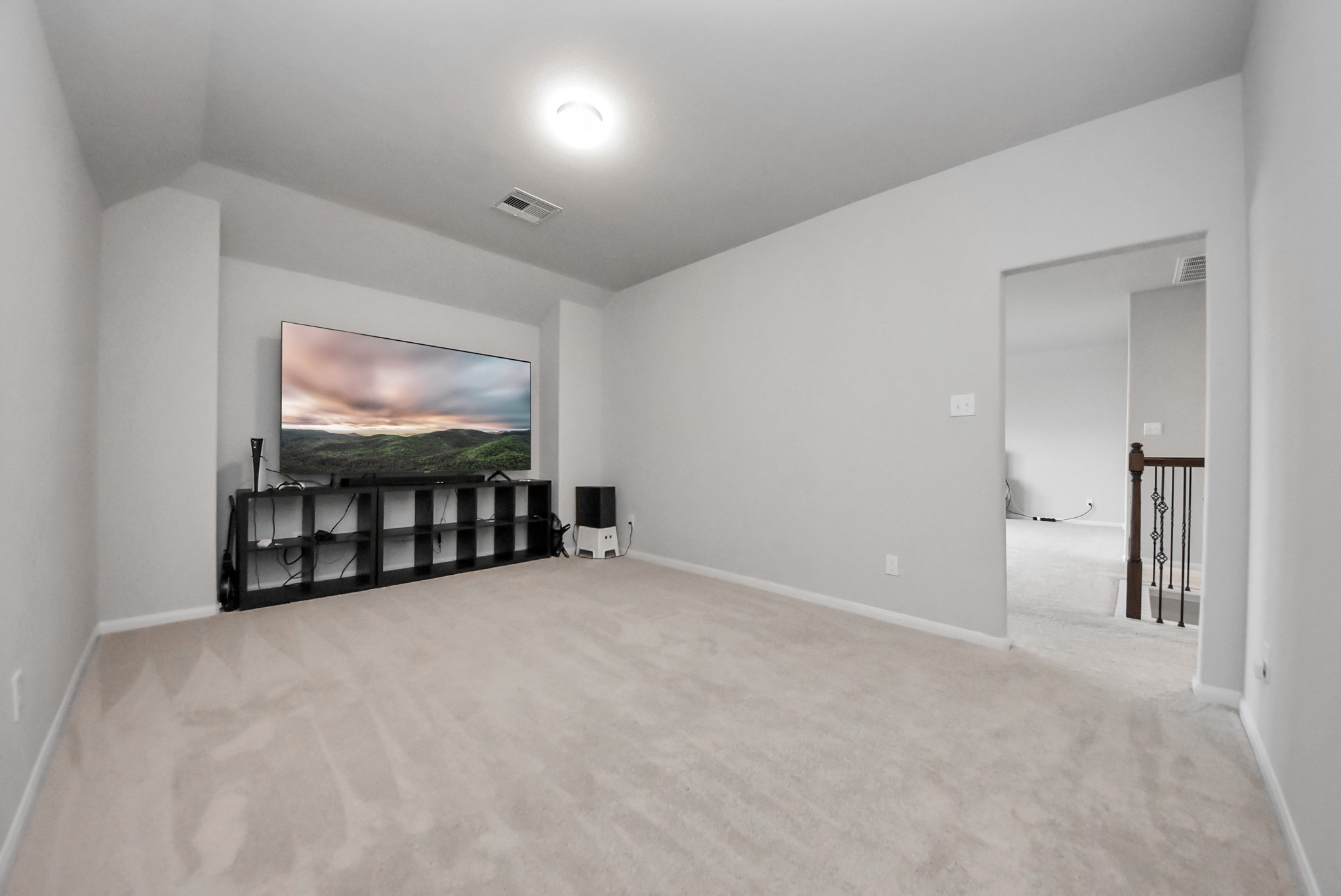 4239 Wyanngate Drive Spring, TX 77373 - Photo 25 of 36 an empty room with windows and closet