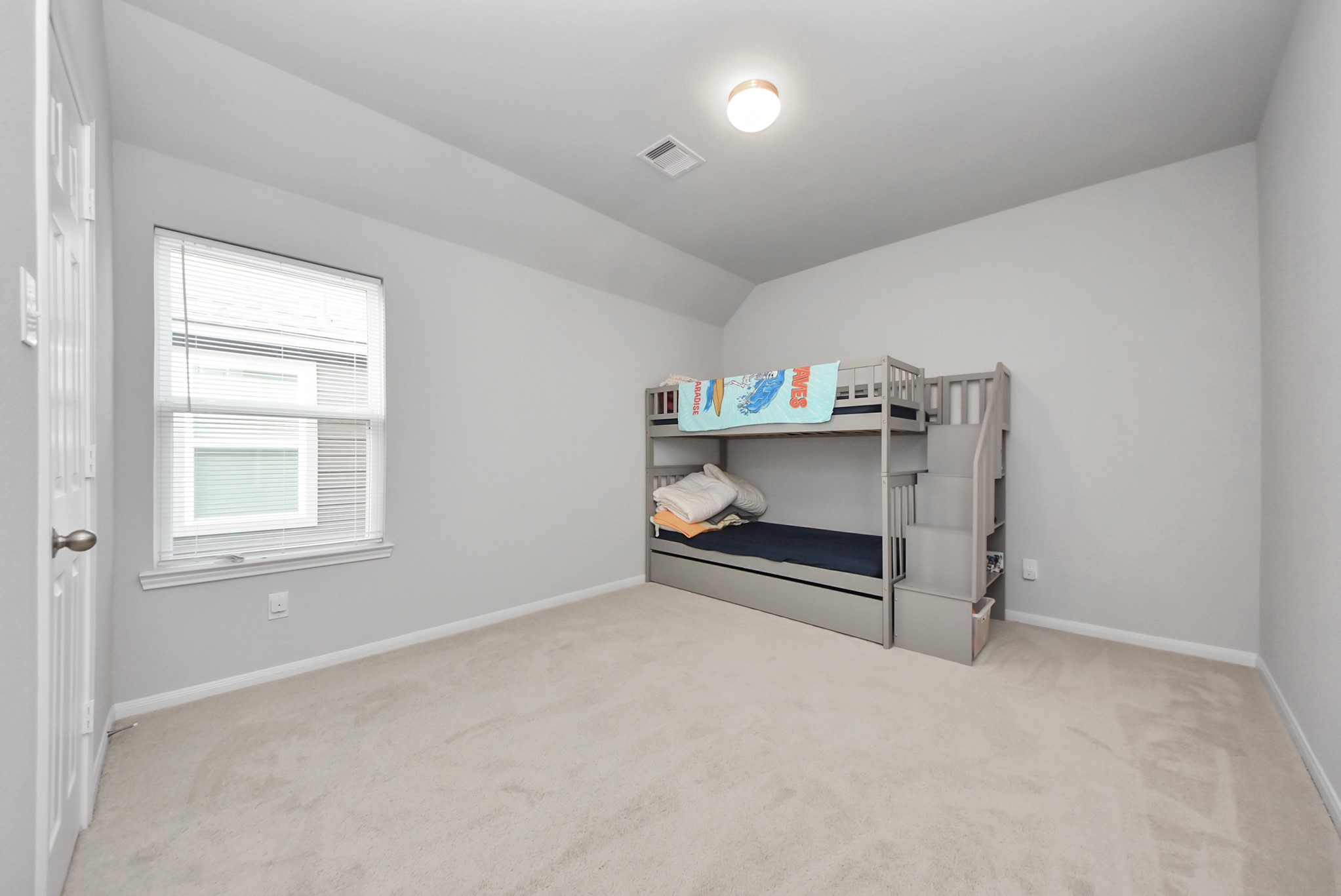 4239 Wyanngate Drive Spring, TX 77373 - Photo 26 of 36 a room with a bed and window