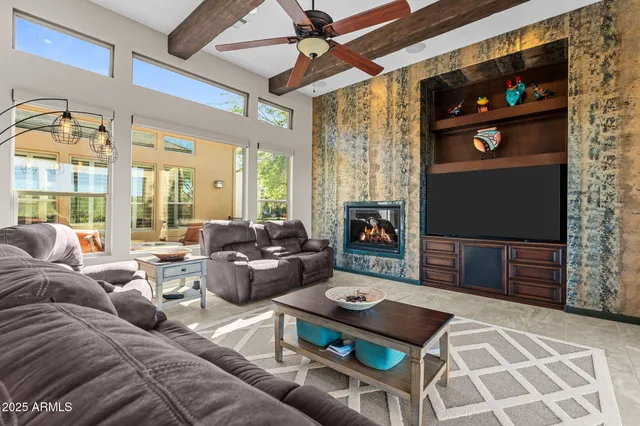 a kitchen with stainless steel appliances granite countertop a stove and a refrigerator