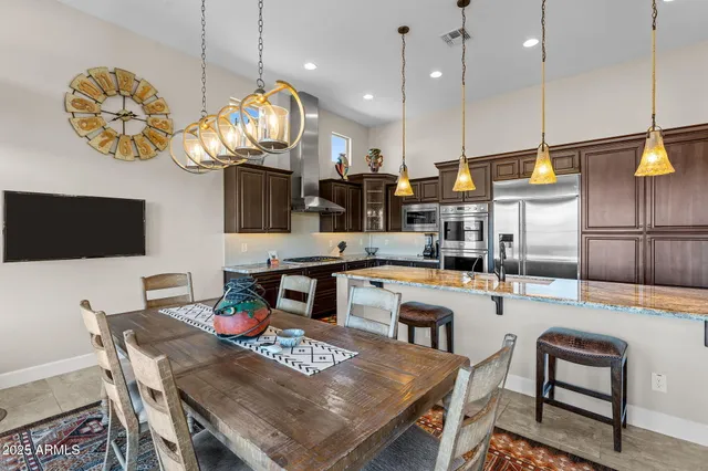 a white bath tub sitting next to a shower