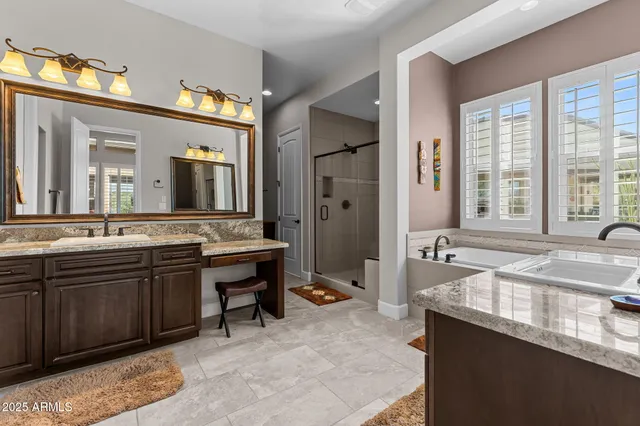 a utility room with sink dryer and washer